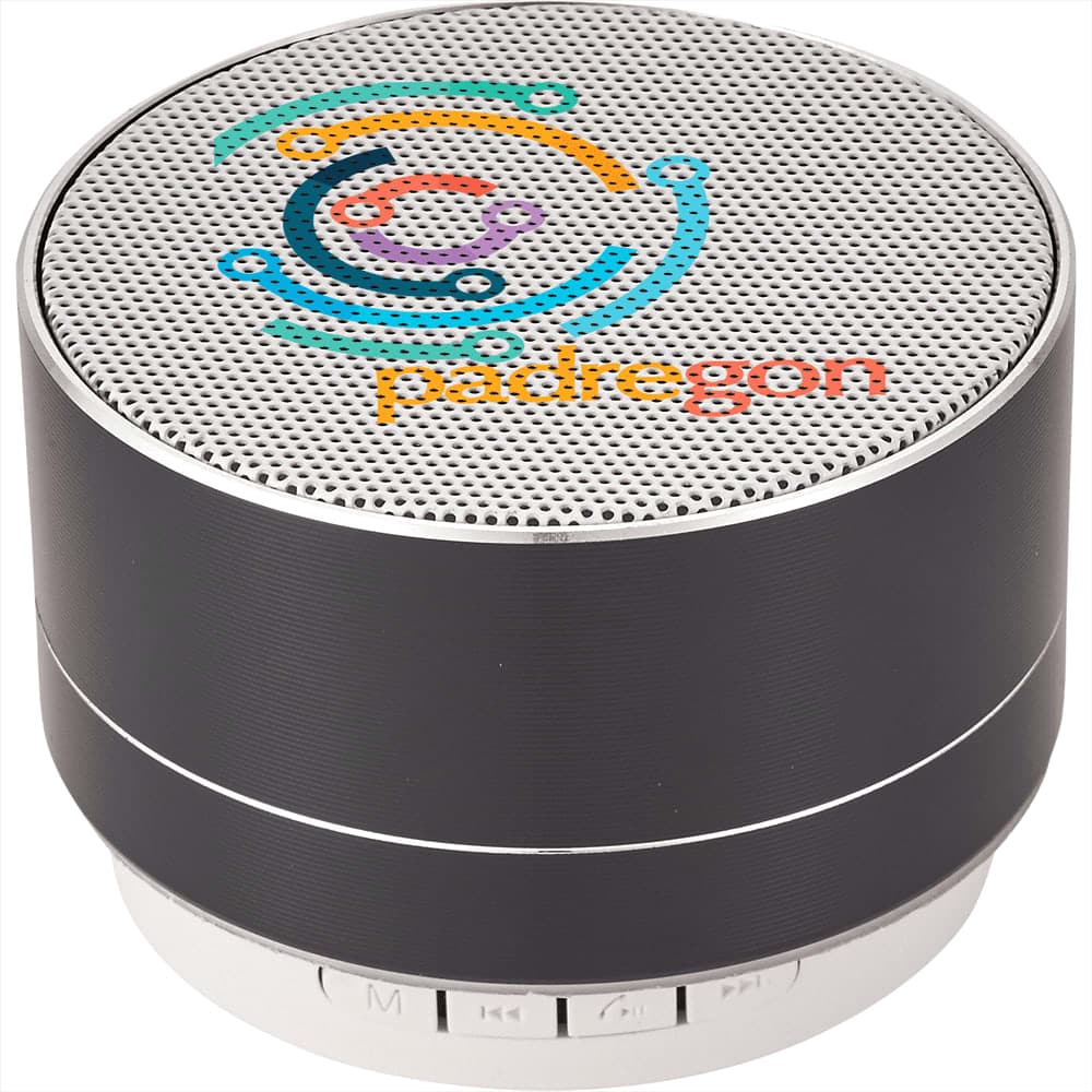 A round black aluminium Bluetooth speaker with a silver grille and control buttons on the base. It has a simple, modern design.