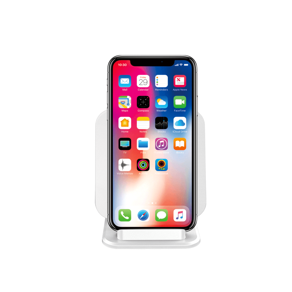 A wireless charger and stand in white with a smartphone displayed, featuring a variety of app icons on the screen.
