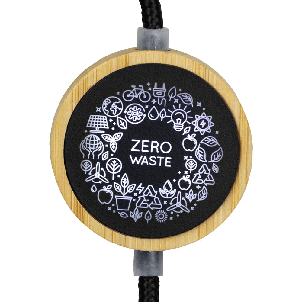 A circular charging cable with a black and bamboo design, featuring a 