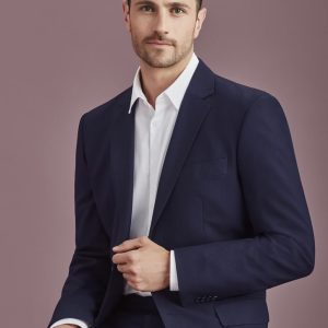 A navy blue men's blazer with a two-button design, featuring a single chest pocket, modelled by a man.