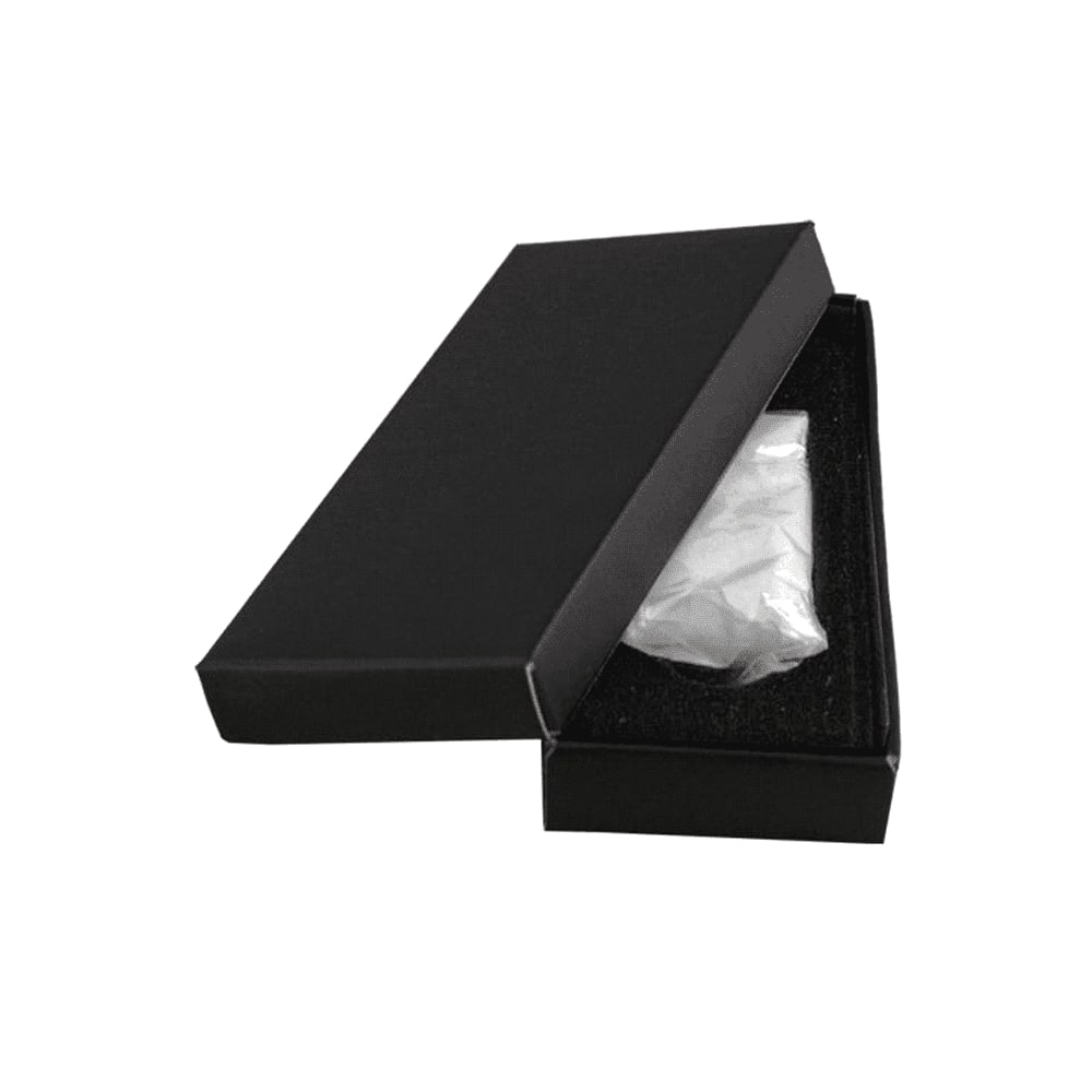 A black gift box partially open, revealing a white item inside, set against a plain background.
