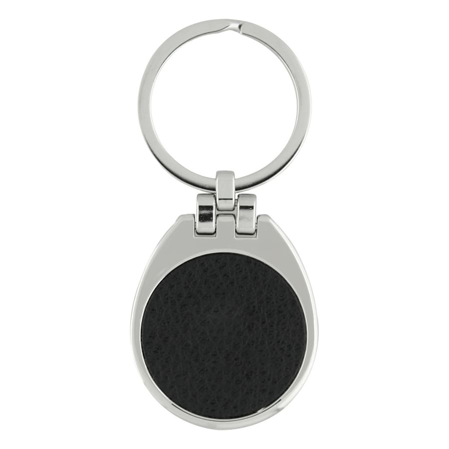 A silver keychain with a round black leather insert and a circular ring for attaching keys.