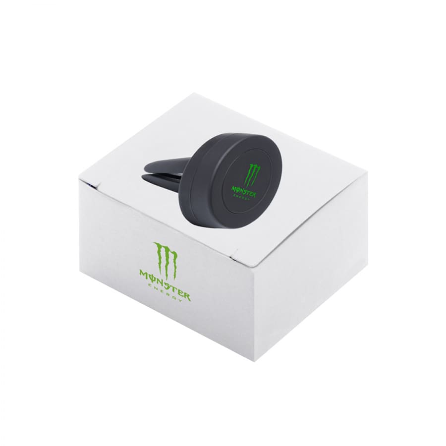 A black magnetic car mount rests on a white box, featuring a logo on the box.