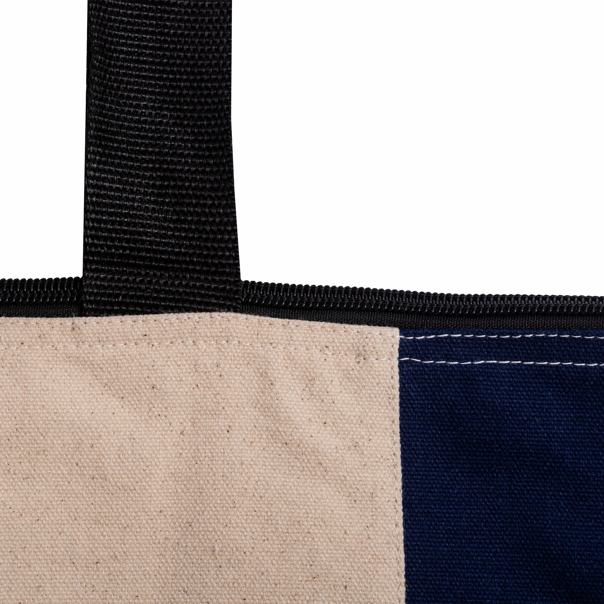 A zippered tote bag featuring a beige and navy design, with sturdy black straps and visible stitching details.
