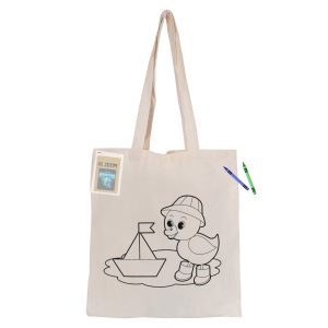 A natural-coloured tote bag featuring a cartoon duck and a boat design, accompanied by crayons and a sticker.