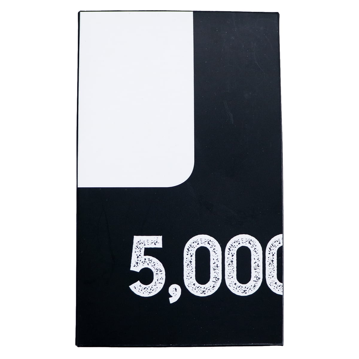 A black power bank package featuring a white section and large text indicating 