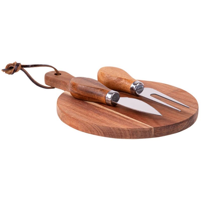 A round wooden cheeseboard with two utensils: a knife and a fork, both featuring wooden handles.