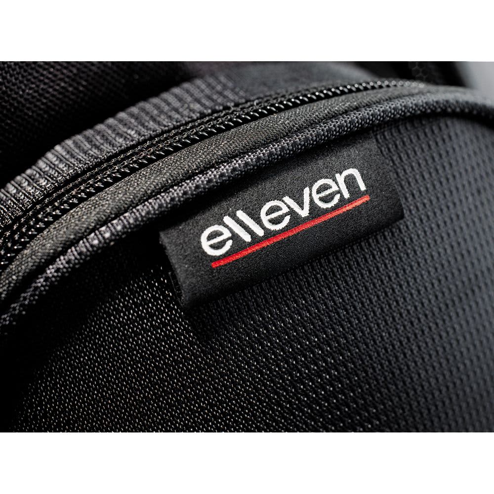 A grey and black checkpoint-friendly compu-backpack with padded straps and a structured back panel.