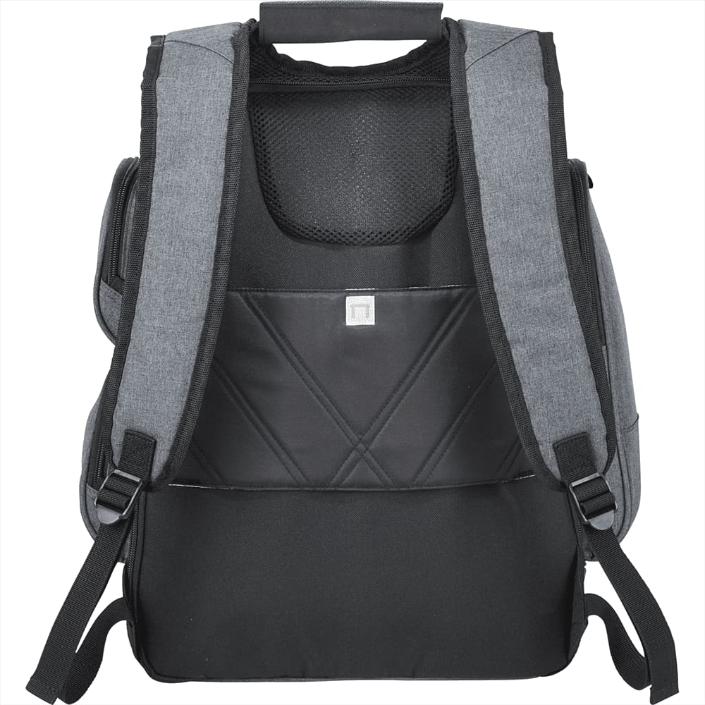 A close-up of a black backpack featuring a red logo tag and a textured mesh pocket.