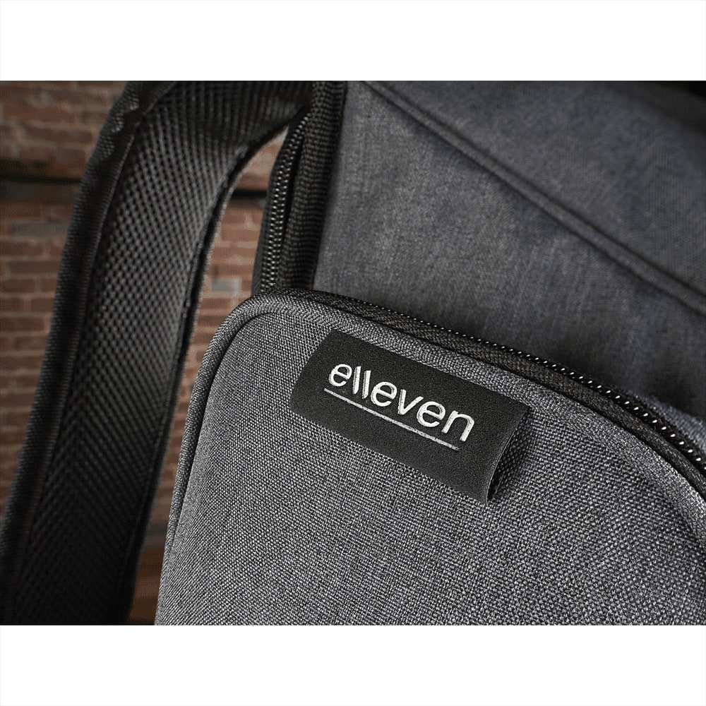 A black backpack featuring mesh detailing and a branded logo, showcasing its material and construction.