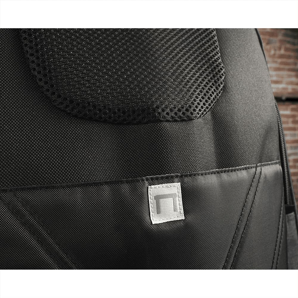 A grey backpack interior featuring pockets for pens, mesh storage, and a loop for attaching accessories.