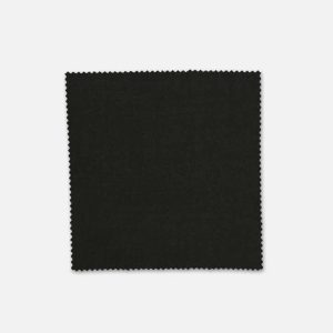 A square swatch of dark green wool fabric with a textured finish and a scalloped edge. It features a branding logo.