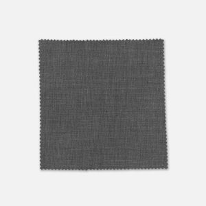 A textured grey fabric swatch for men's suiting, featuring a fine weave and a slightly stretchable quality.