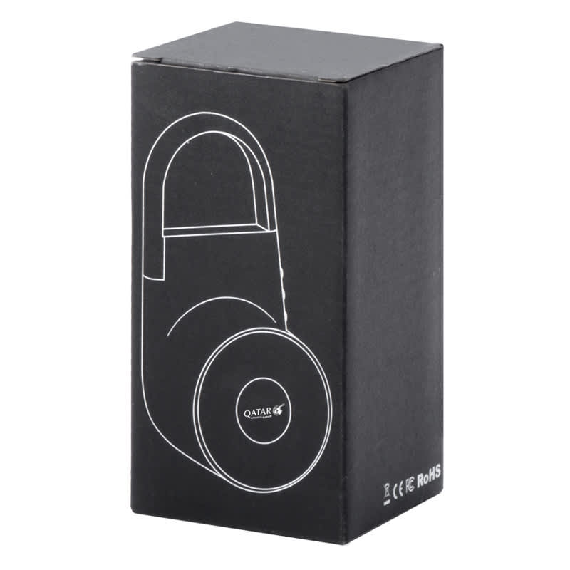 A black box containing a wireless speaker design with a round base and a handle. The box features a logo.