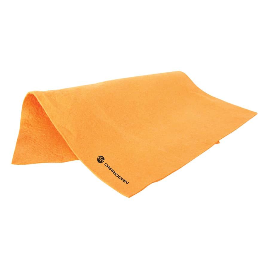 A large orange chamois bath towel with a logo on one edge.