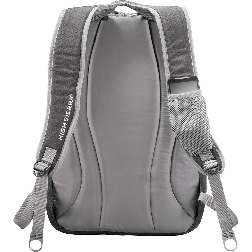 A black backpack with multiple pockets and a matching black duffel bag, set against an airport seating area.