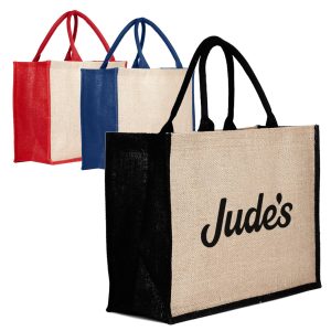 Three jute bags in red, blue, and black with a natural coloured body and a logo on the front.