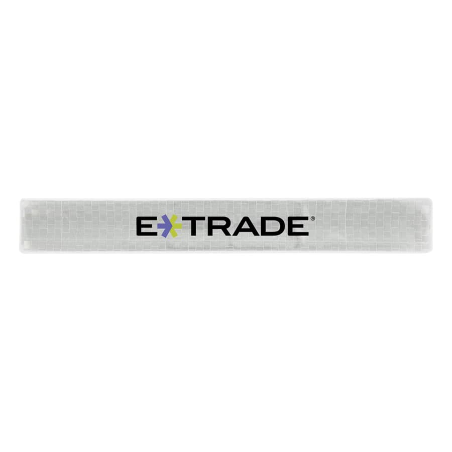 A reflective slap wristband in clear material featuring a logo. Suitable for events and exhibitions.