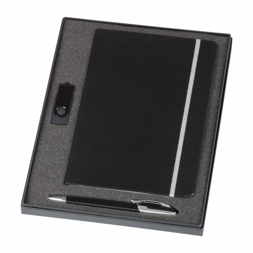 A black notebook with a silver stripe and a pen, presented in a fitted black box with a foam insert.