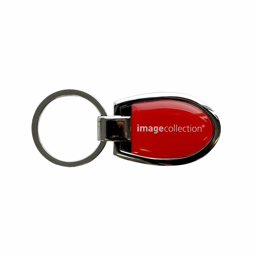 A rectangular keychain with a bright red and silver design, featuring a logo on one side.