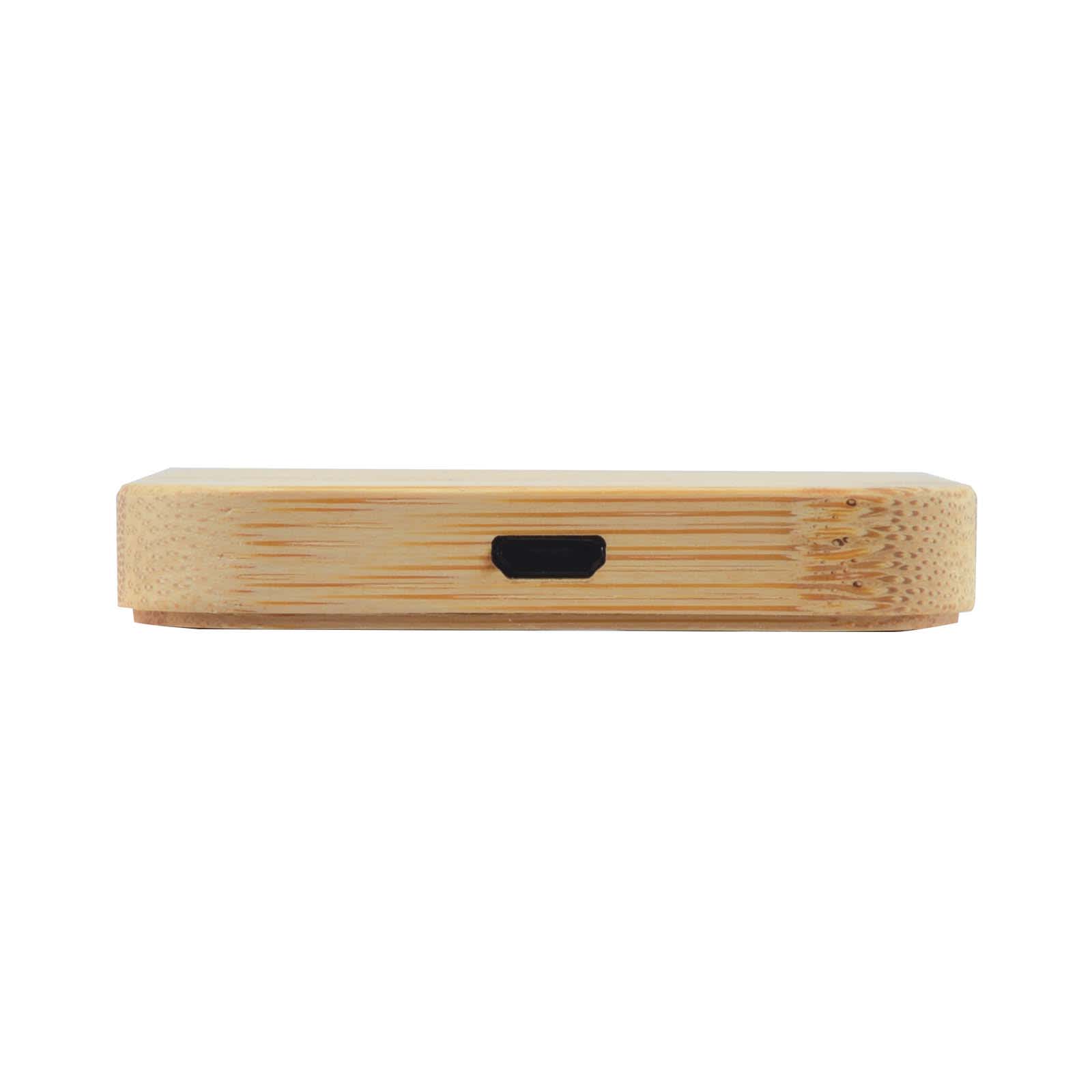 A bamboo wireless charger with a sleek, square design featuring a charging port on the side.