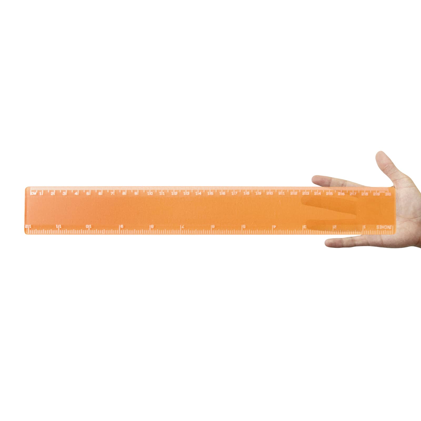 A transparent 30cm ruler held in a hand, featuring clear metric and imperial measurements along its length.