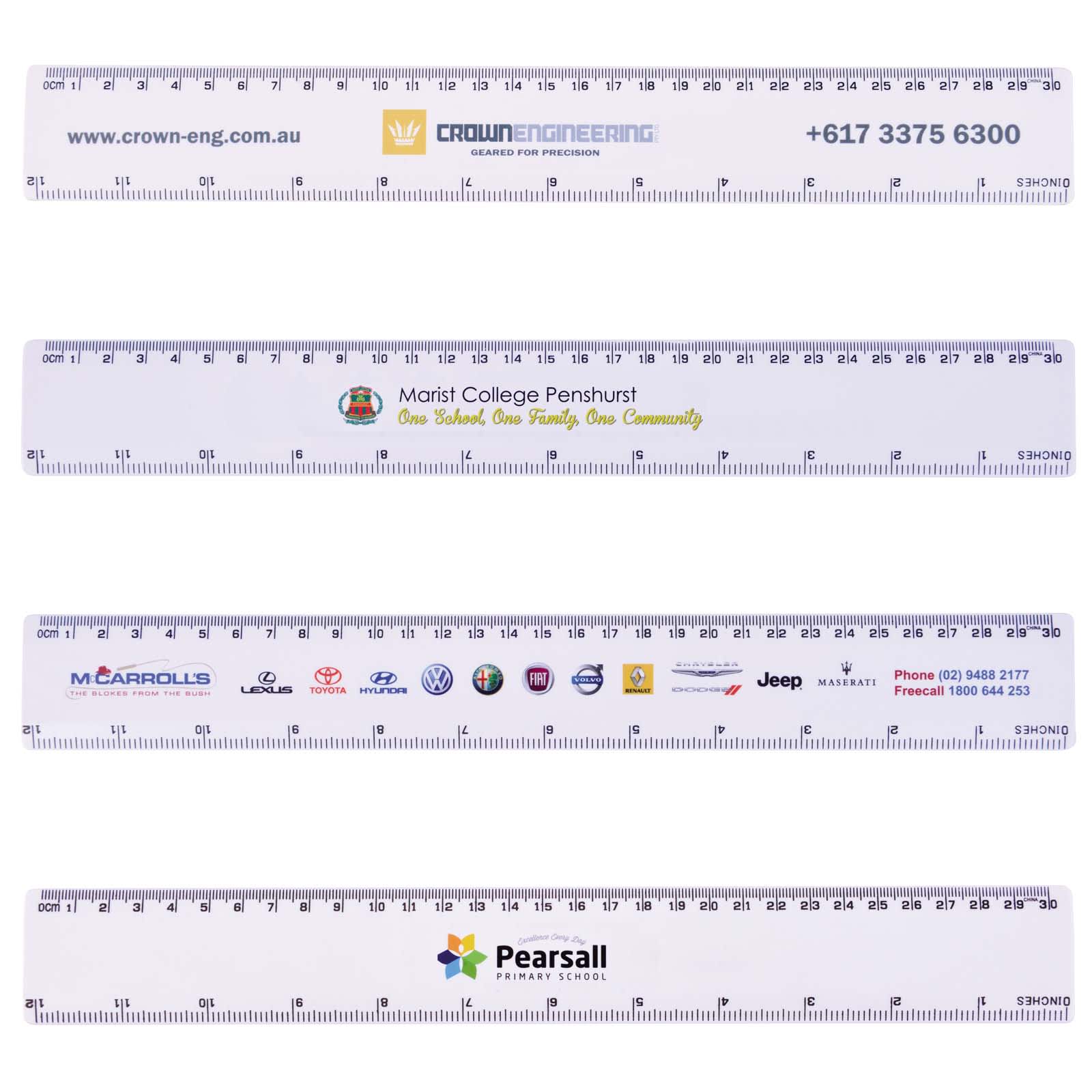 A white 30cm ruler with various logos and branding, featuring measurement markings along the edges.