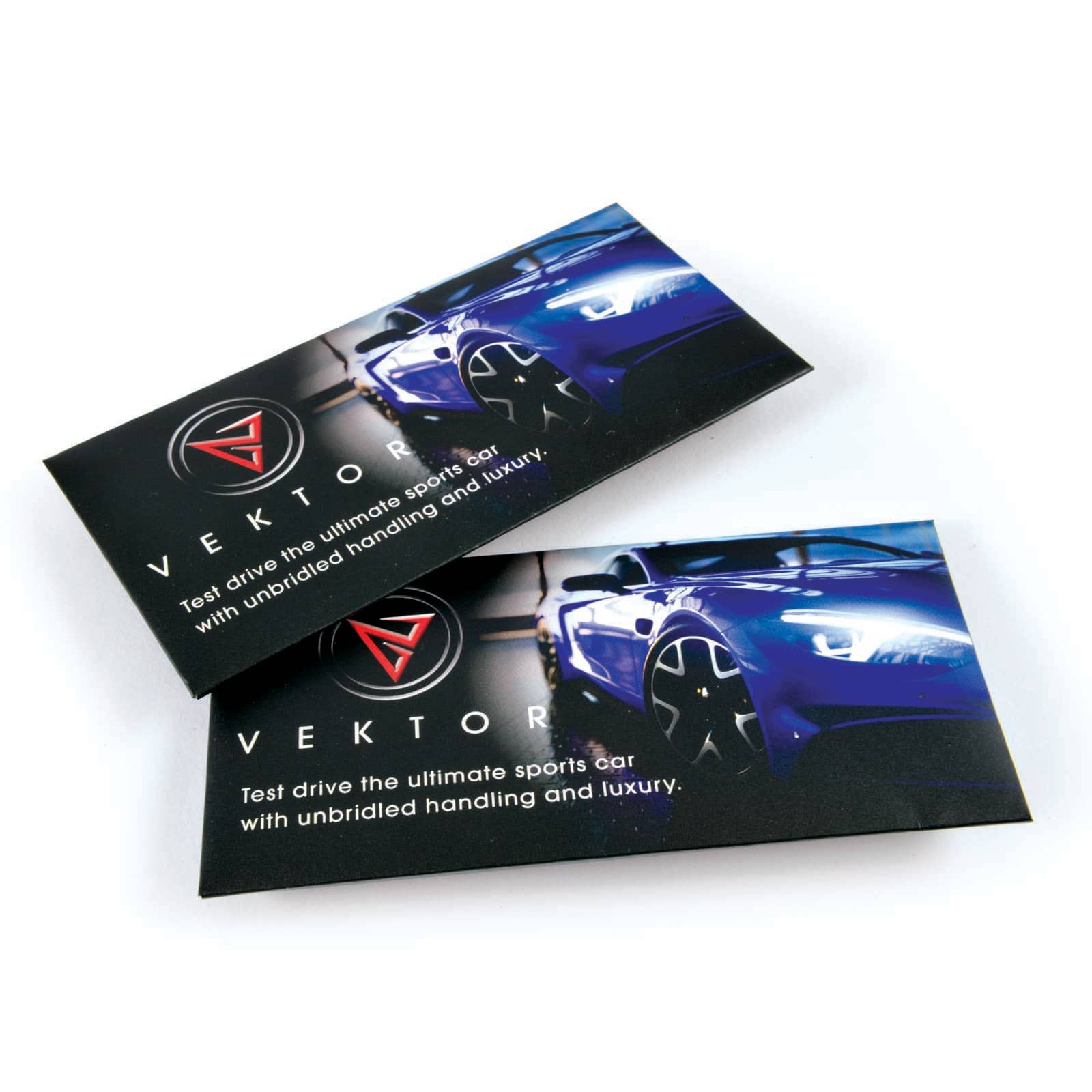 Two printed promotional cards featuring a sleek blue sports car and a logo, set against a dark background.