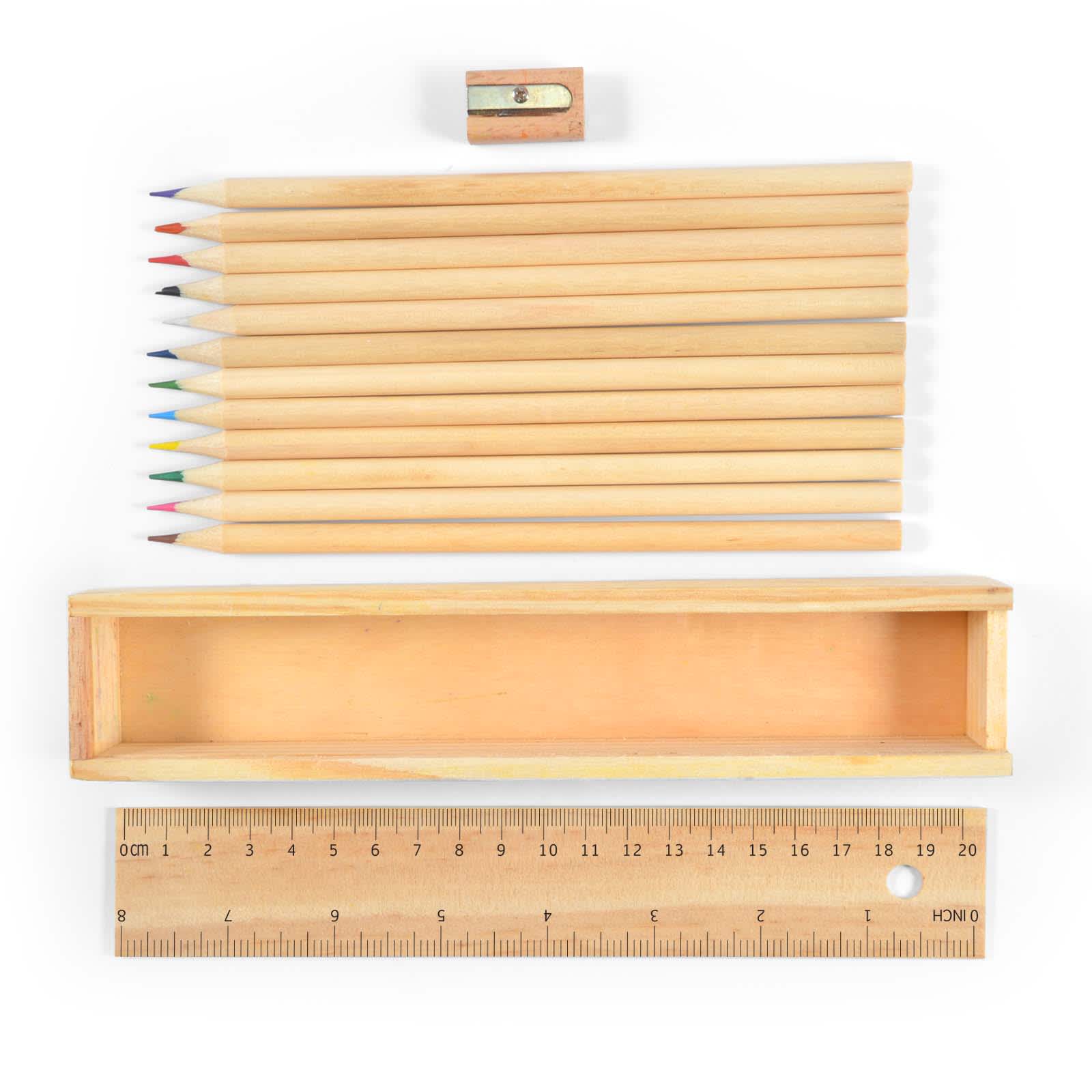 A wooden box containing a set of colored pencils in various colors, with a sharpener and a wooden ruler.