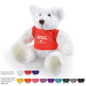 A plush teddy bear in white with a red T-shirt, featuring a logo. Various other T-shirt colours are displayed nearby.