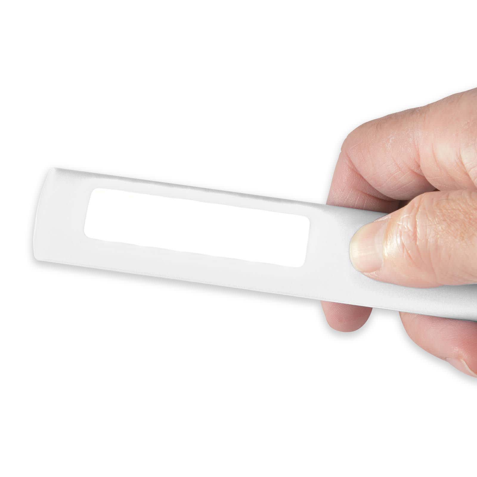 A Blaze Torch lighter is held in a hand, featuring a sleek design and a blank white label area for customization.