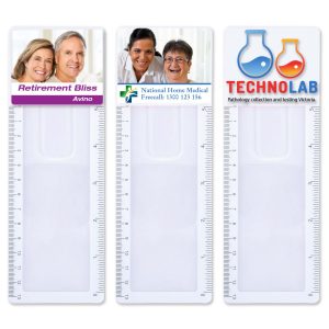 A set of three transparent bookmark magnifier rulers featuring colorful images and incorporated branding.