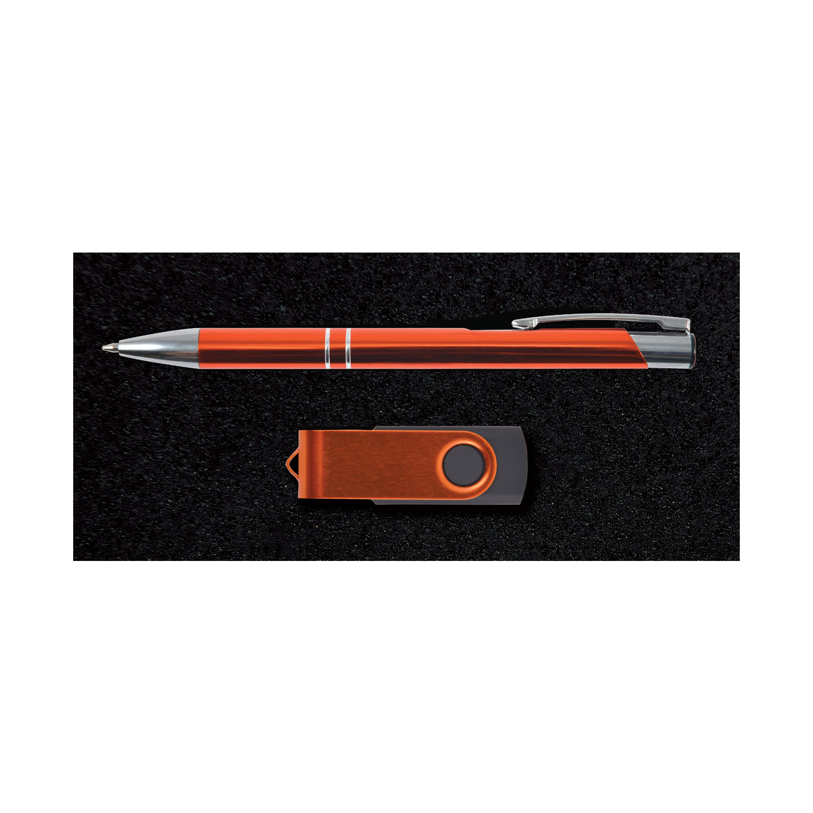 A gift set featuring a sleek pen and a modern USB flash drive, both displayed in a dark presentation box.