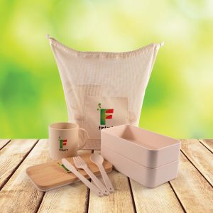 An eco-friendly pack including a tote bag, reusable containers, a cup, and cutlery, all featuring a logo.