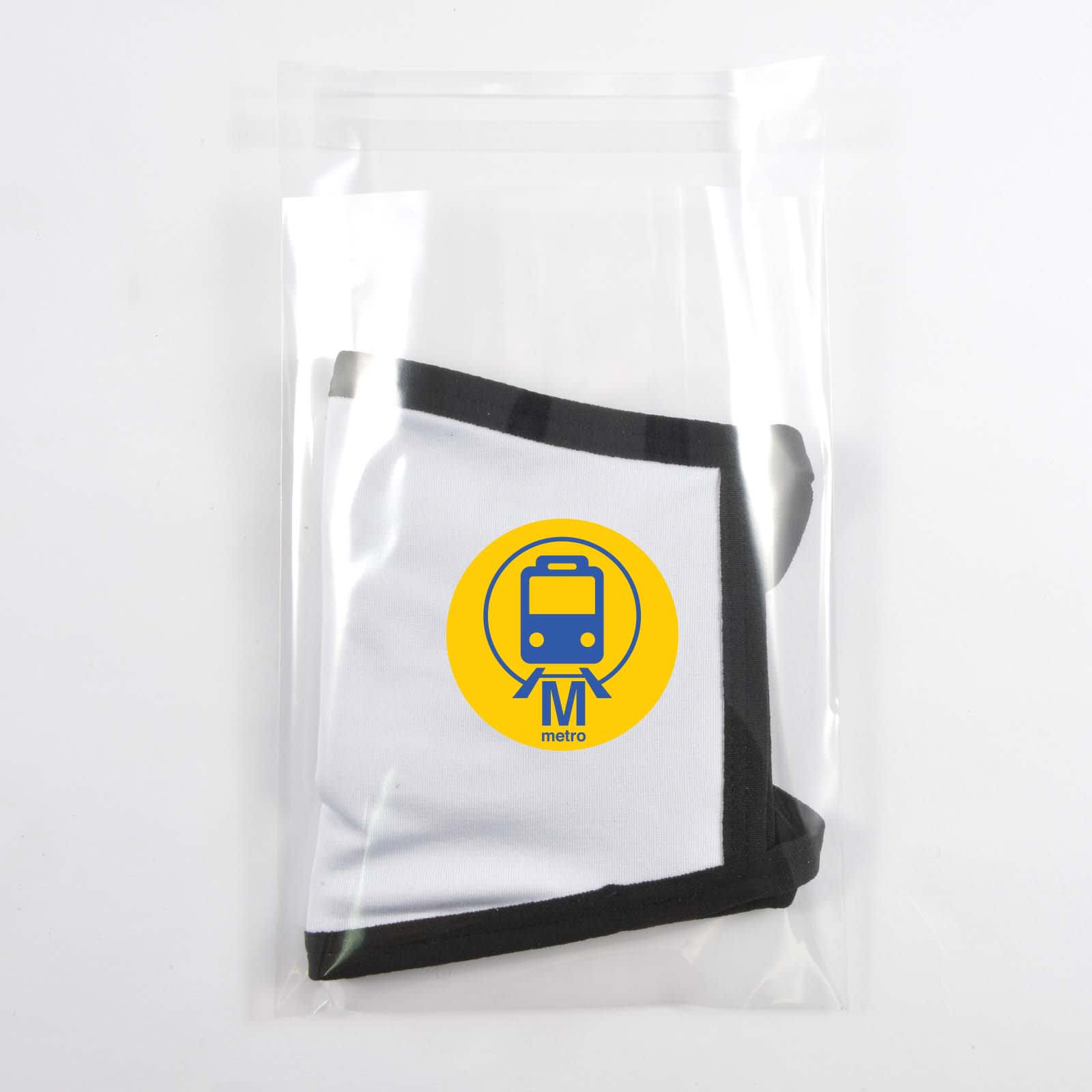 A cotton face mask in white and black packaging with a circular logo featuring a yellow train design.