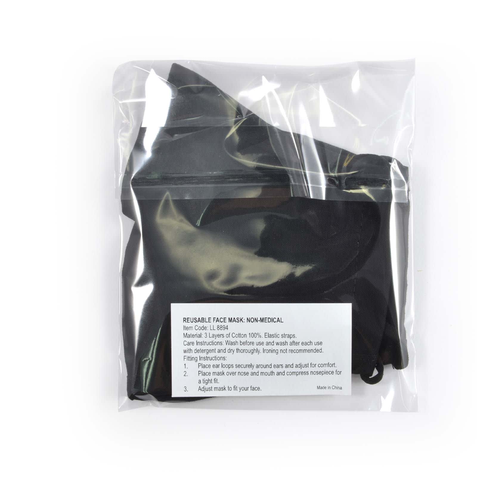 A reusable black face mask packaged in a clear plastic bag, featuring instructions and care details on the label.