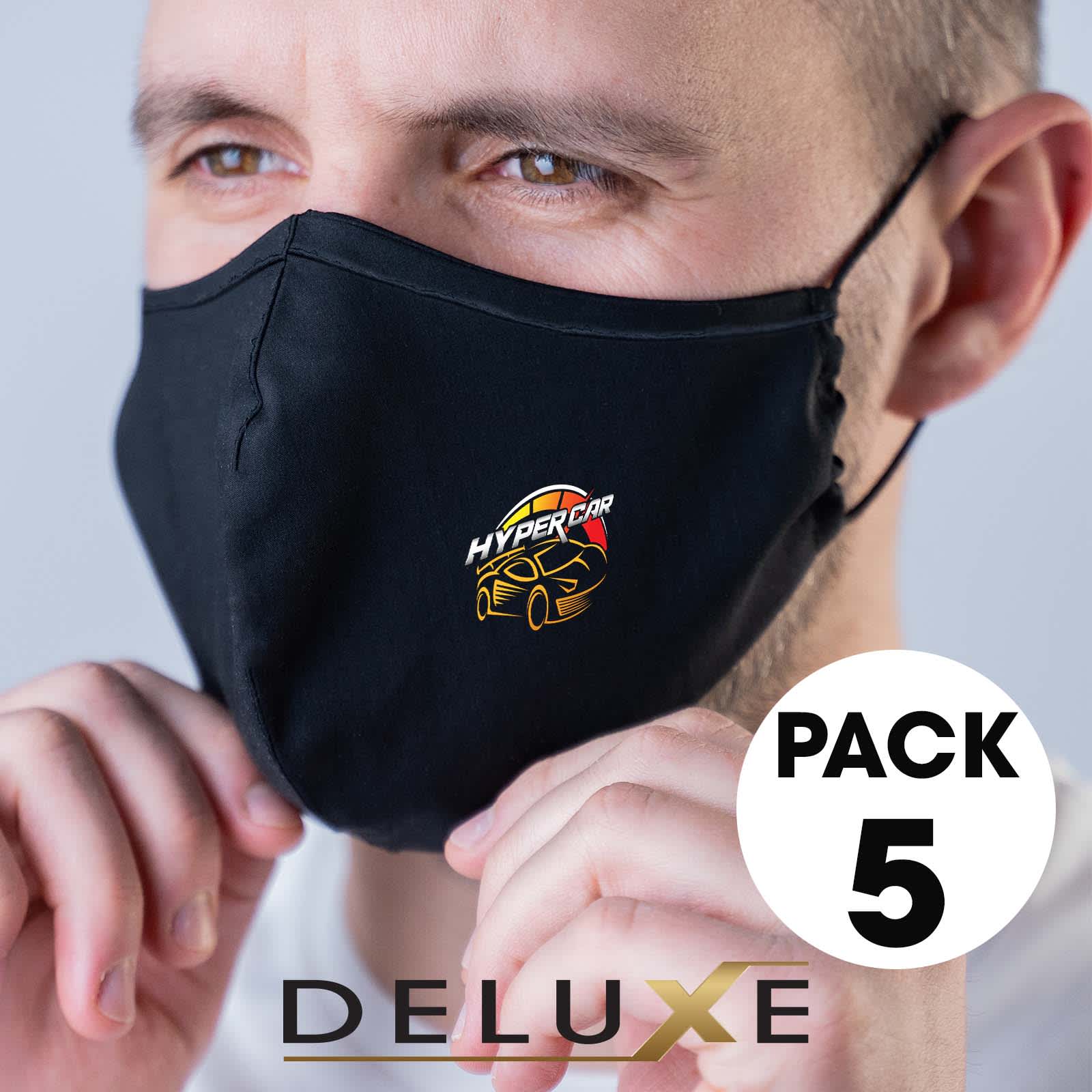 A set of five deluxe black face masks featuring a logo. The masks are worn by a person.