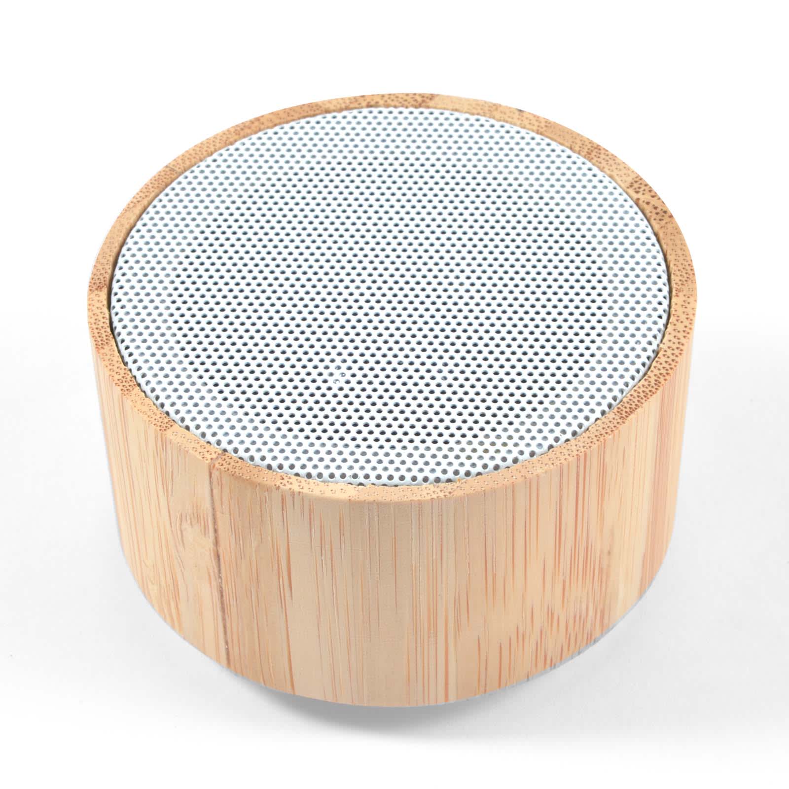 A bamboo Bluetooth speaker featuring a circular design with a perforated upper surface.