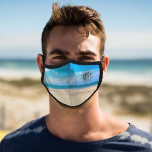A Deluxe Adult Face Mask featuring a scenic beach design with a logo.