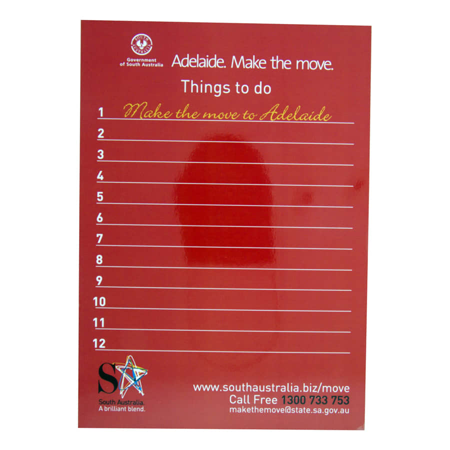 A red magnetic whiteboard featuring a list format with ten lines for notes and a logo at the bottom.