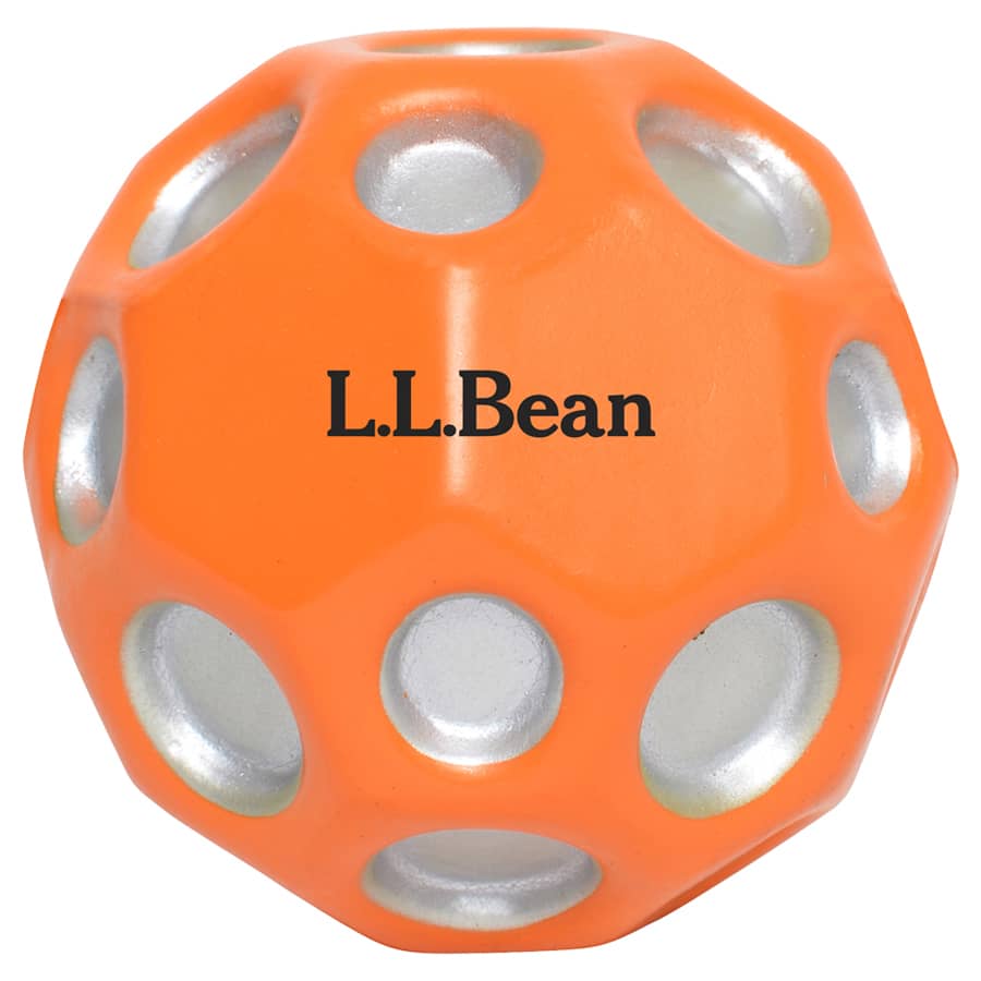 An orange high bounce ball with silver accents and a logo on its surface.