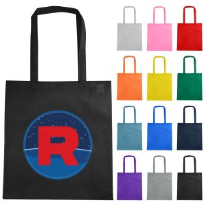 A black non-woven reusable grocery bag with a large logo, surrounded by bags in various colours including pink, yellow, and green.