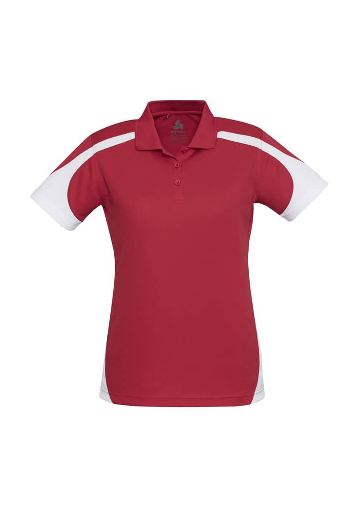 A red and white short sleeve polo shirt featuring a branded logo. Classic fit with a collar and button placket.