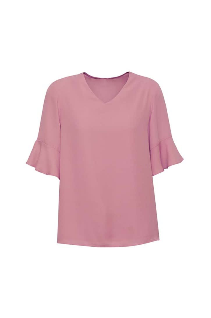 A pink fluted sleeve blouse with a V-neck design, featuring a simple and elegant style. It has a branding logo.