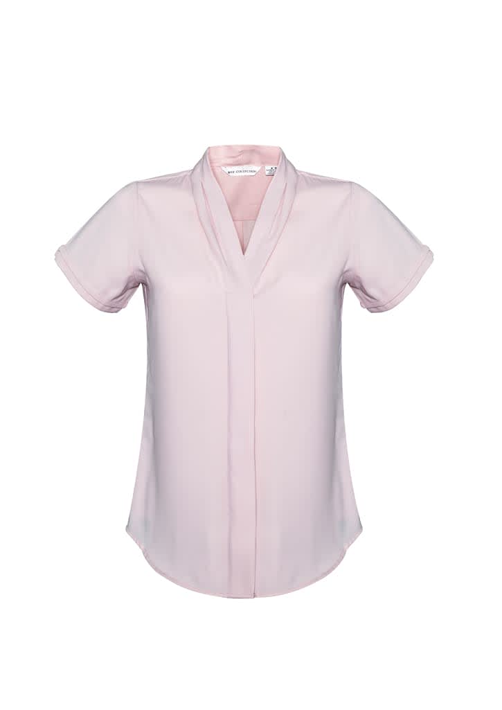 A pink women's short sleeve button-up shirt featuring a collar and a branded logo.