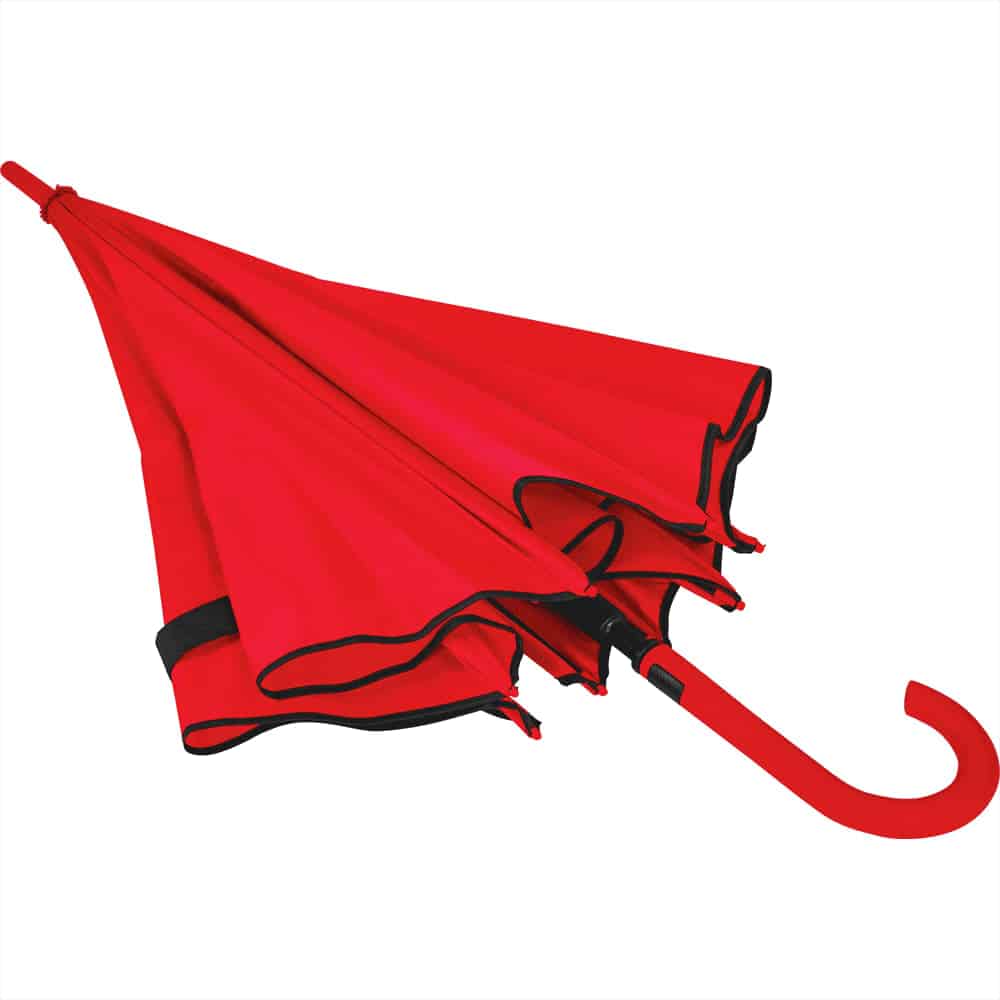 A red umbrella with a curved handle and black accents, featuring an auto open mechanism. It has a logo on it.