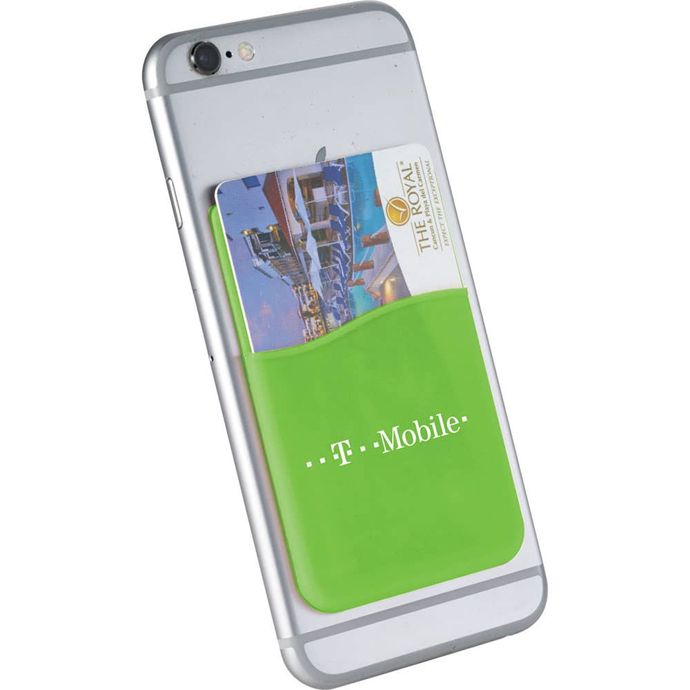 A green silicone card wallet attached to a smartphone, holding a card inside. The wallet features branding.