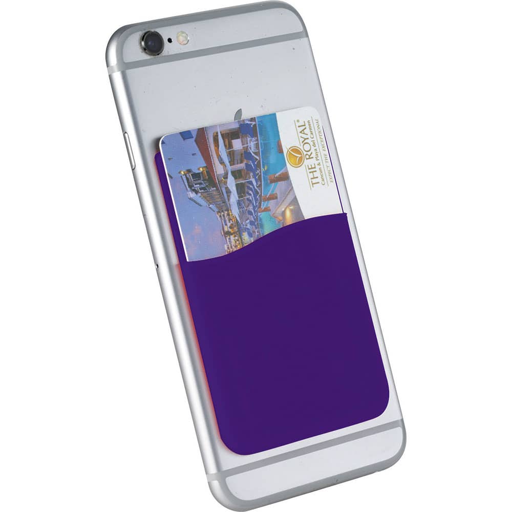 A slim purple silicone card wallet attached to the back of a smartphone, holding a credit card.