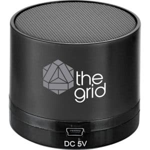 A black cylindrical Bluetooth speaker with a textured top and a logo on the side.