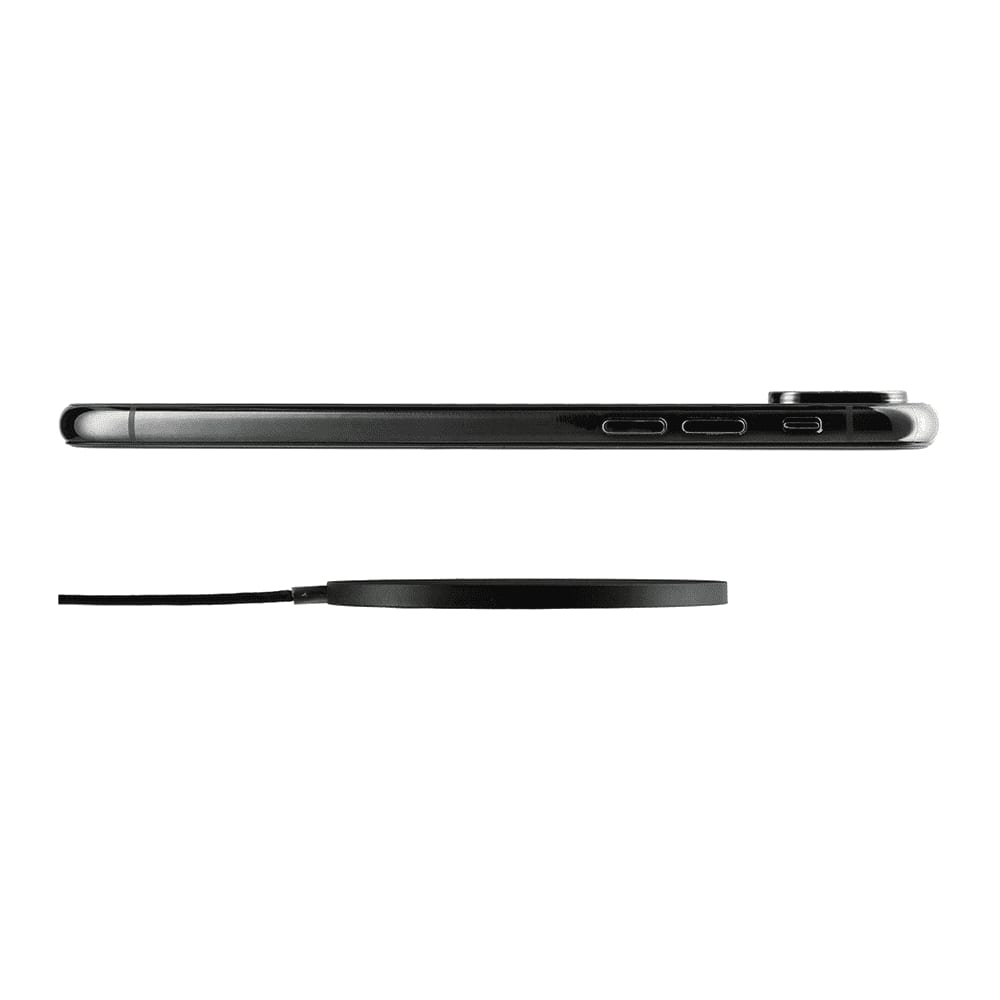 A black ultra-thin wireless charging pad positioned below a sleek black smartphone, highlighting their slim profiles.
